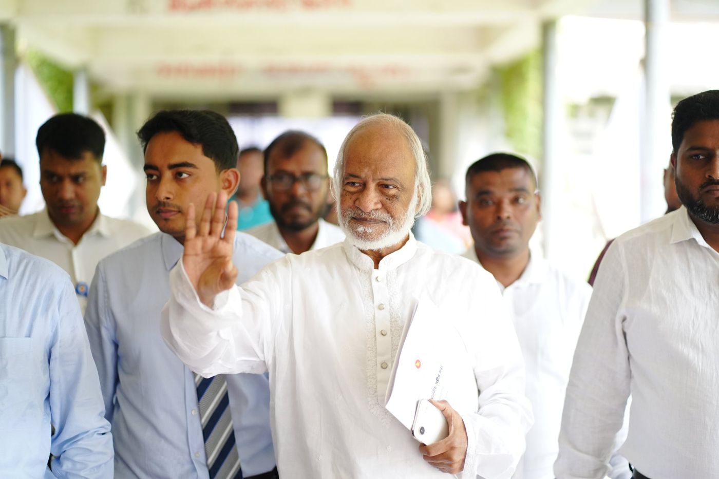Shazid walking with guests